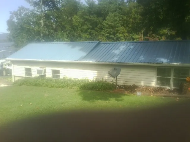 Blue metal roof running the length of a single story home in Collingswood